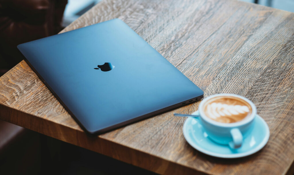 Working on a laptop in a coffee shop